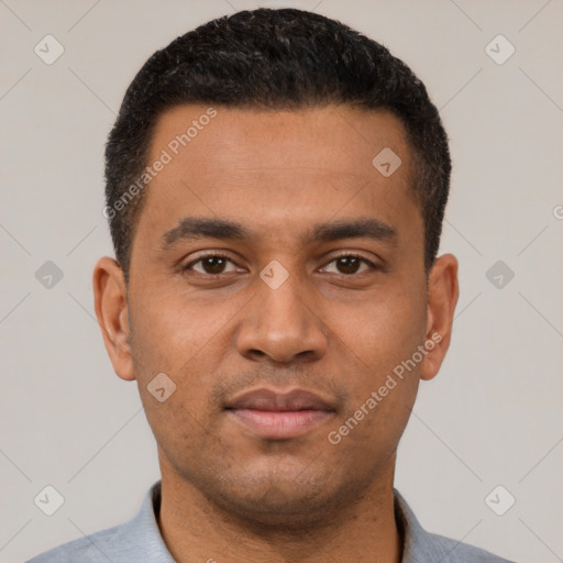 Neutral latino young-adult male with short  black hair and brown eyes