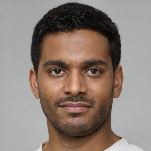 Neutral black young-adult male with short  black hair and brown eyes