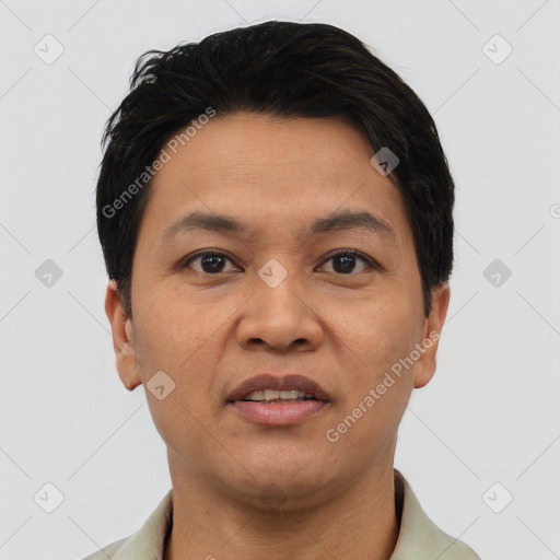 Joyful asian young-adult male with short  black hair and brown eyes