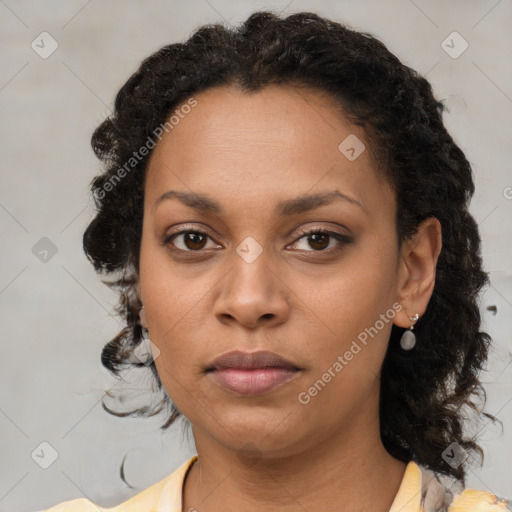 Neutral black young-adult female with medium  brown hair and brown eyes