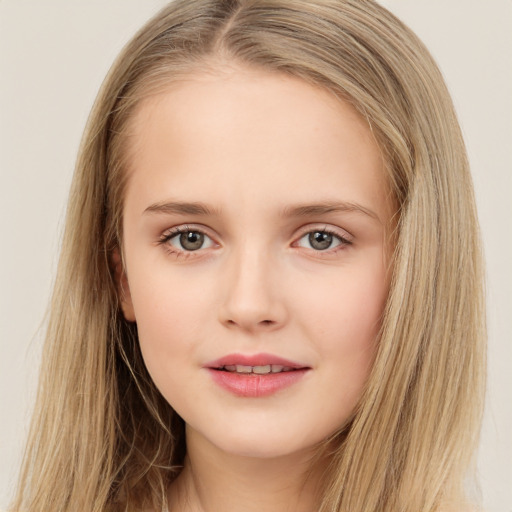 Joyful white child female with long  brown hair and brown eyes