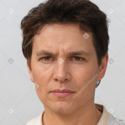 Neutral white adult male with short  brown hair and brown eyes