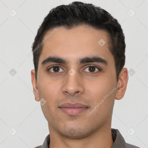 Neutral latino young-adult male with short  black hair and brown eyes