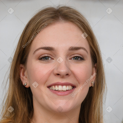 Joyful white young-adult female with long  brown hair and grey eyes