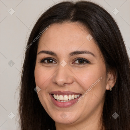 Joyful white young-adult female with long  brown hair and brown eyes