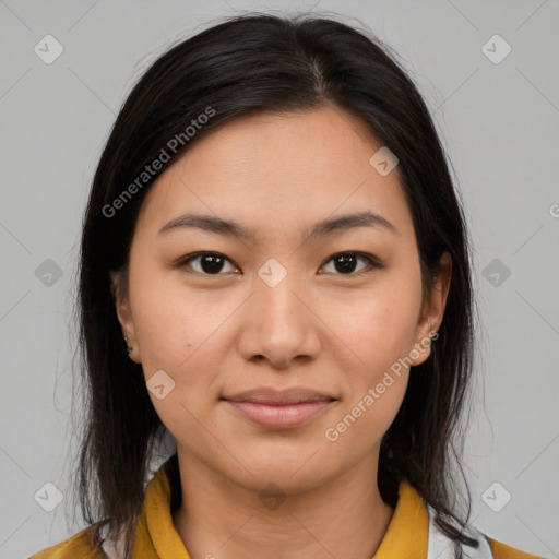 Joyful latino young-adult female with medium  brown hair and brown eyes