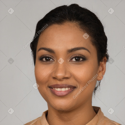 Joyful latino young-adult female with short  black hair and brown eyes