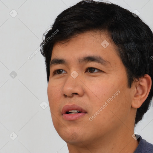 Neutral asian young-adult male with short  black hair and brown eyes