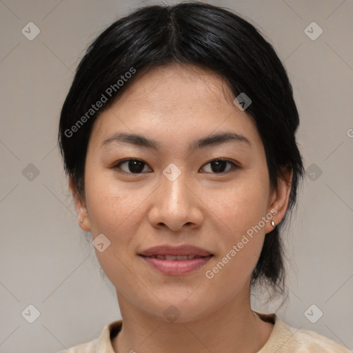 Joyful asian young-adult female with medium  brown hair and brown eyes