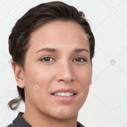 Joyful white young-adult female with short  brown hair and grey eyes