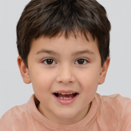 Joyful white child male with short  brown hair and brown eyes