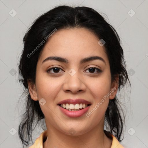 Joyful latino young-adult female with medium  brown hair and brown eyes