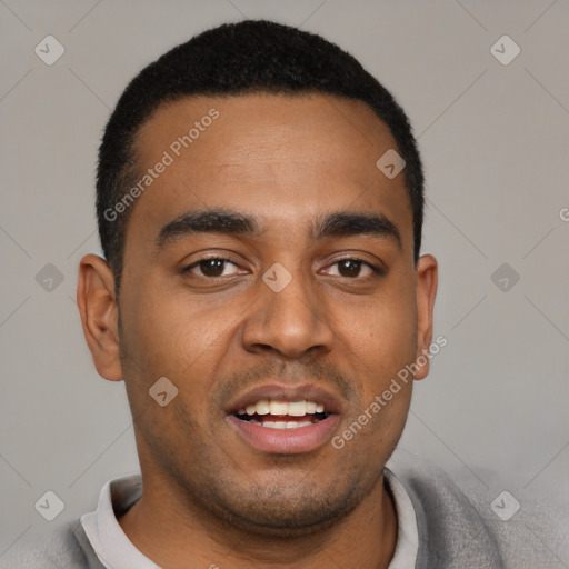 Joyful black young-adult male with short  black hair and brown eyes