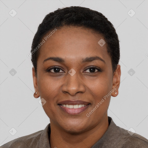 Joyful black young-adult female with short  black hair and brown eyes
