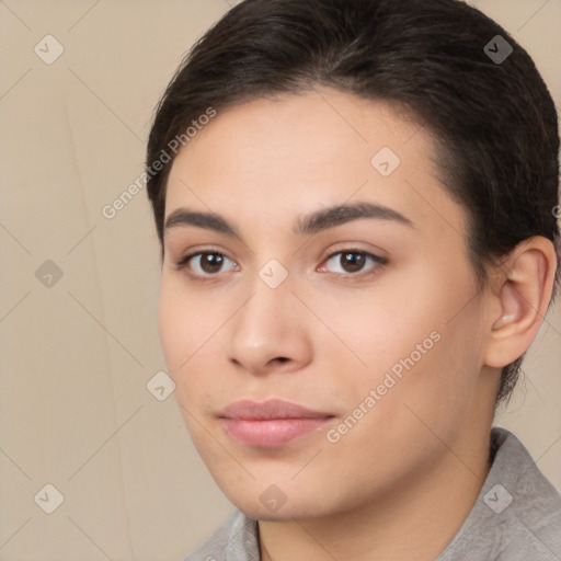 Neutral white young-adult female with medium  brown hair and brown eyes