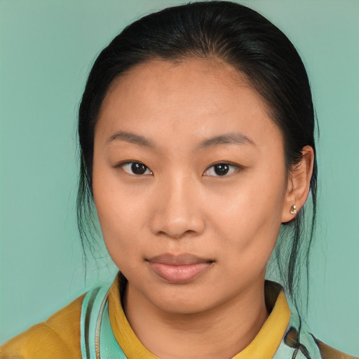 Joyful asian young-adult female with medium  brown hair and brown eyes