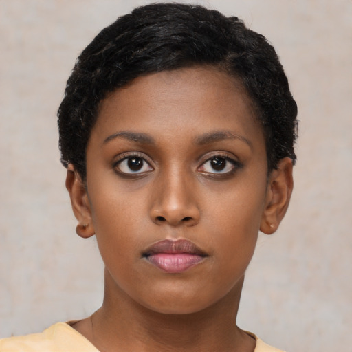 Neutral black young-adult female with short  black hair and brown eyes