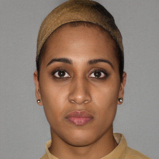 Neutral black young-adult female with short  brown hair and brown eyes