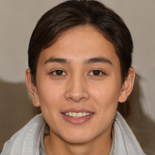 Joyful white young-adult female with medium  brown hair and brown eyes