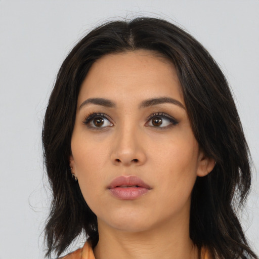 Neutral asian young-adult female with medium  brown hair and brown eyes