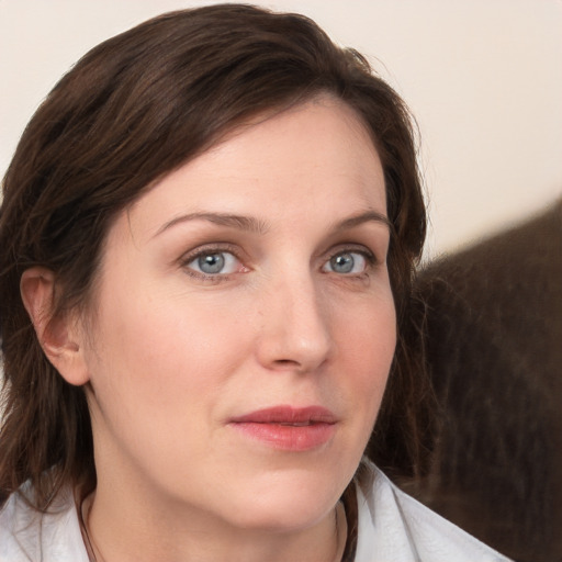 Neutral white young-adult female with medium  brown hair and grey eyes