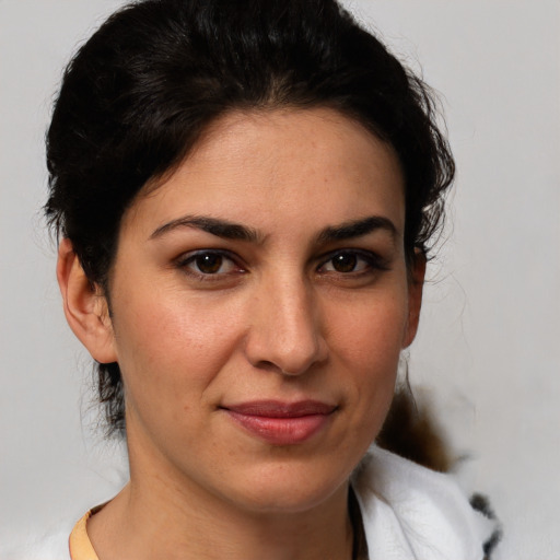 Joyful white young-adult female with medium  brown hair and brown eyes