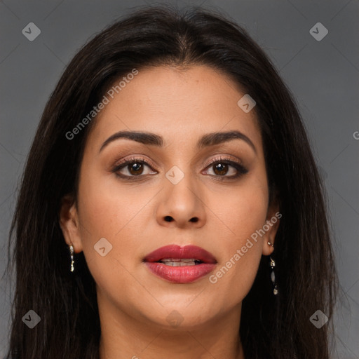 Joyful latino young-adult female with long  brown hair and brown eyes