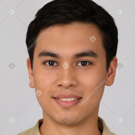 Joyful white young-adult male with short  black hair and brown eyes