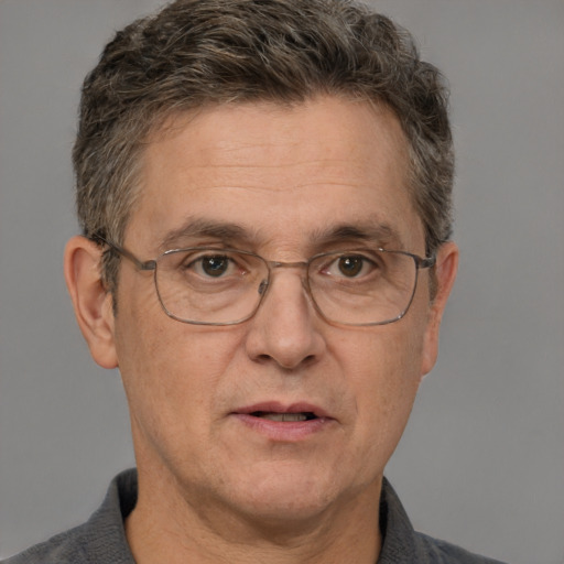 Neutral white middle-aged male with short  brown hair and brown eyes