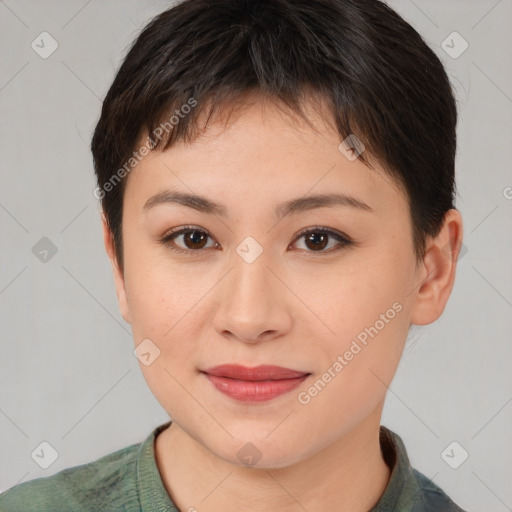 Joyful asian young-adult female with short  brown hair and brown eyes