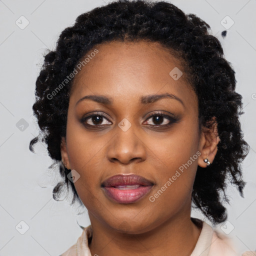 Joyful black young-adult female with medium  black hair and brown eyes