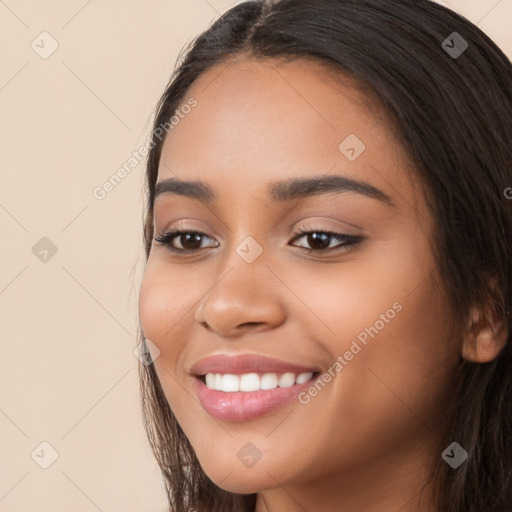 Joyful white young-adult female with long  black hair and brown eyes