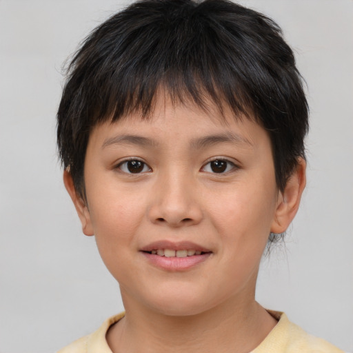 Joyful white child female with short  brown hair and brown eyes