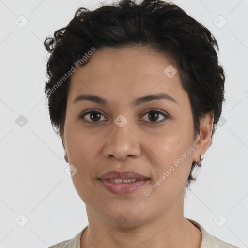 Joyful white adult female with short  brown hair and brown eyes