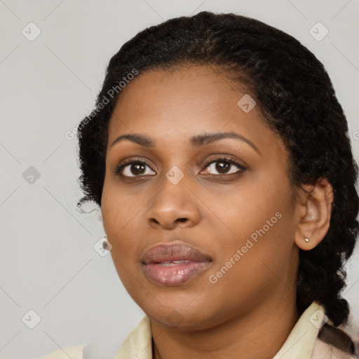 Neutral black young-adult female with medium  black hair and brown eyes