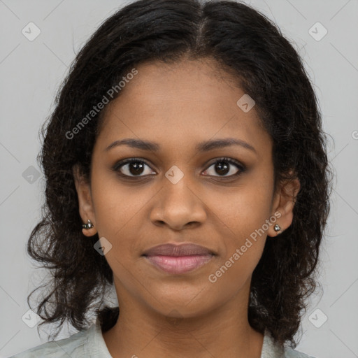 Joyful black young-adult female with medium  brown hair and brown eyes