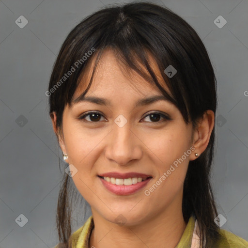 Joyful latino young-adult female with medium  brown hair and brown eyes