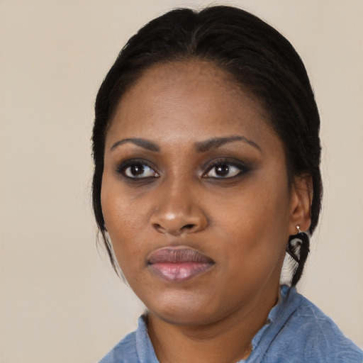 Neutral black young-adult female with medium  black hair and brown eyes