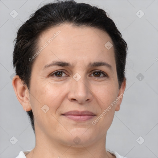 Joyful white adult female with short  brown hair and brown eyes