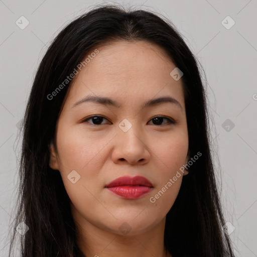 Joyful asian young-adult female with long  brown hair and brown eyes