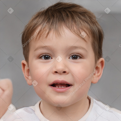 Joyful white child male with short  brown hair and brown eyes