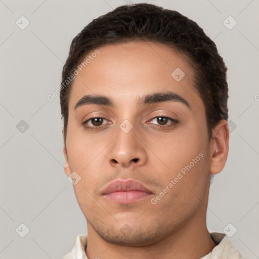 Neutral white young-adult male with short  brown hair and brown eyes