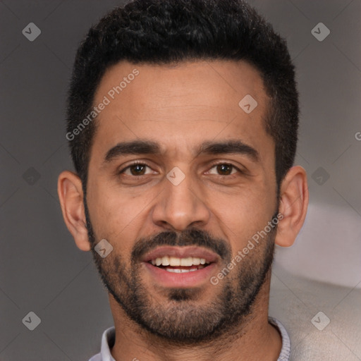 Joyful white young-adult male with short  black hair and brown eyes