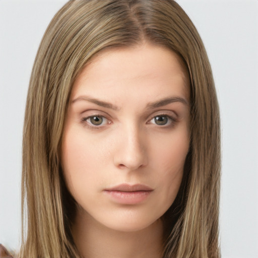 Neutral white young-adult female with long  brown hair and brown eyes