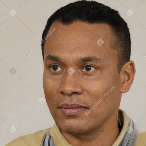 Neutral black adult male with short  black hair and brown eyes