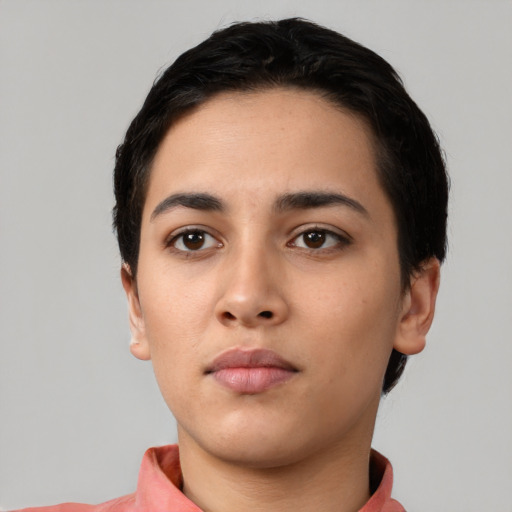 Neutral latino young-adult female with short  black hair and brown eyes