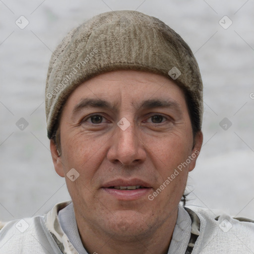 Joyful white adult male with short  brown hair and grey eyes