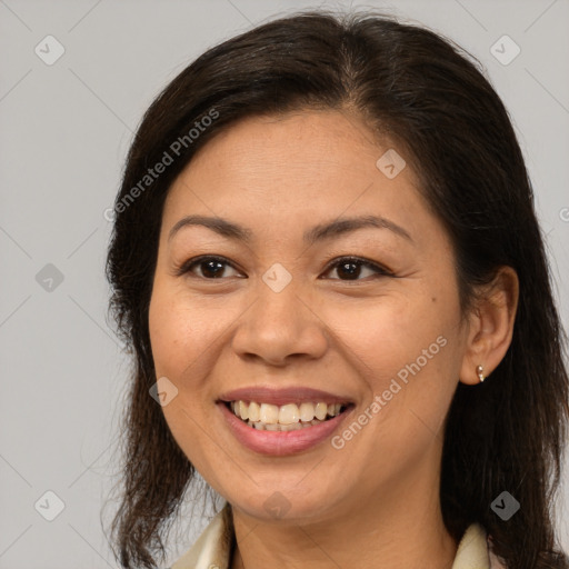 Joyful white young-adult female with long  brown hair and brown eyes