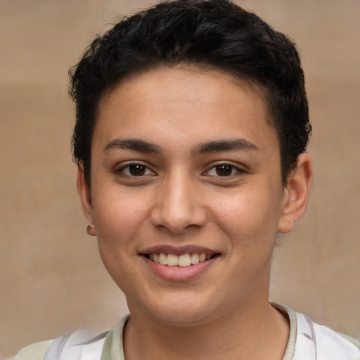 Joyful latino young-adult female with short  brown hair and brown eyes