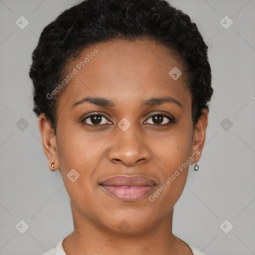 Joyful black young-adult female with short  black hair and brown eyes